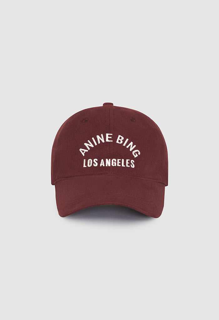 CHERRY LA Logo-print Twill Trucker Hat in Red